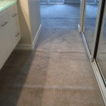 Gray berber loose and buckled carpet in vanity and into bedroom before stretching